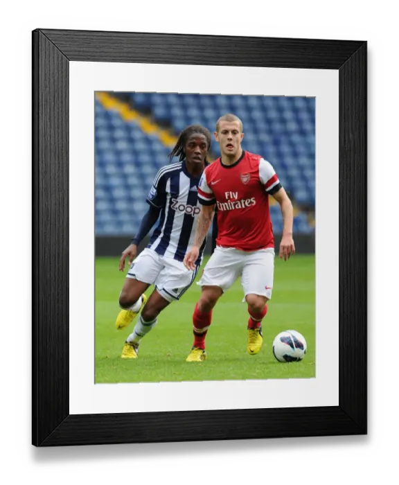 Framed Print : Clash of the Young Midfield Talents: Jack Wilshere vs. Romaine Sawyers (Arsenal U21 vs. West Bromwich Albion U21, 2012-13) Framed Print : Clash of the Young Midfield Talents: Jack Wilshere vs. Romaine Sawyers (Arsenal U21 vs. West Bromwich Albion U21, 2012-13)