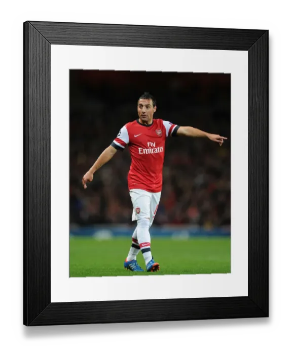 Framed Print : Santi Cazorla in Action: Arsenal vs. Olympiacos, UEFA Champions League (2012)