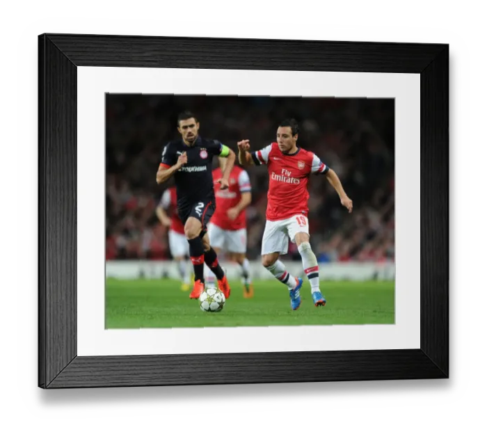 Framed Print : Santi Cazorla Outmaneuvers Giannis Maniatis: Arsenal FC vs Olympiacos FC, UEFA Champions League, 2012