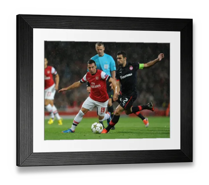 Framed Print : Arsenal's Triumph: 3-1 Victory Over Olympiacos in UEFA Champions League Group B (2012) Framed Print : Arsenal's Triumph: 3-1 Victory Over Olympiacos in UEFA Champions League Group B (2012)