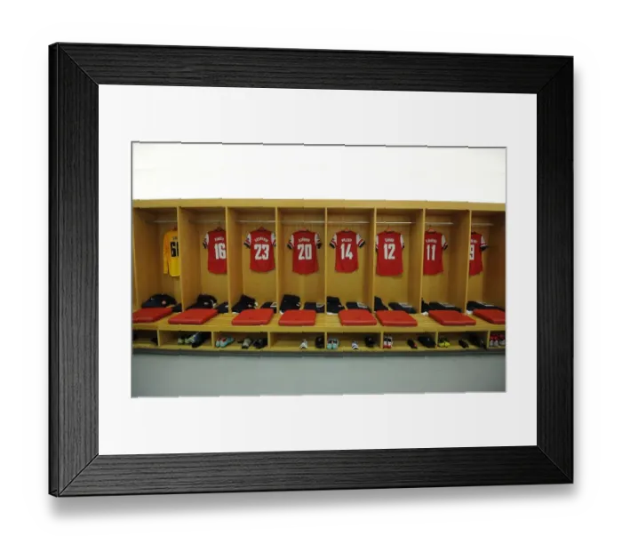 Framed Print : Arsenal FC Changing Room Before UEFA Champions League Match against Olympiacos (2012-13)