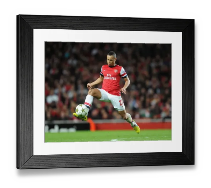 Framed Print : Arsenal's Coquelin Shines: 3-1 Victory Over Olympiacos in Champions League Group B at Emirates Stadium