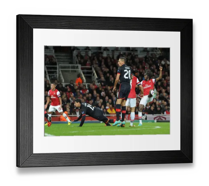 Framed Print : Gervinho Scores First Goal: Arsenal's 3-1 Victory Over Olympiacos in UEFA Champions League Group B (2012-13) Framed Print : Gervinho Scores First Goal: Arsenal's 3-1 Victory Over Olympiacos in UEFA Champions League Group B (2012-13)