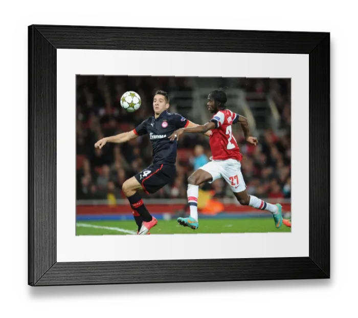 Framed Print : Gervinho's Brace: Arsenal's Triumph over Olympiacos in Champions League - 3-1