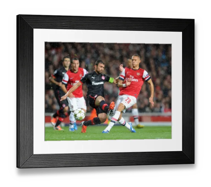 Framed Print : Arsenal Triumphs Over Olympiacos: Kieran Gibbs Scores in a 3-1 UEFA Champions League Victory Framed Print : Arsenal Triumphs Over Olympiacos: Kieran Gibbs Scores in a 3-1 UEFA Champions League Victory