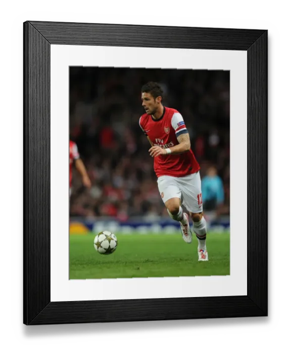 Framed Print : Olivier Giroud in Action: Arsenal vs Olympiacos, UEFA Champions League 2012-13 Framed Print : Olivier Giroud in Action: Arsenal vs Olympiacos, UEFA Champions League 2012-13