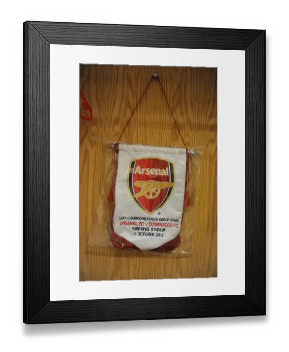 Framed Print : Arsenal FC vs Olympiacos FC: UEFA Champions League Showdown at Emirates Stadium (2012-13)