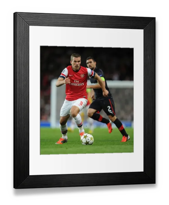 Framed Print : Lukas Podolski in Action: Arsenal vs. Olympiacos, UEFA Champions League 2012-13