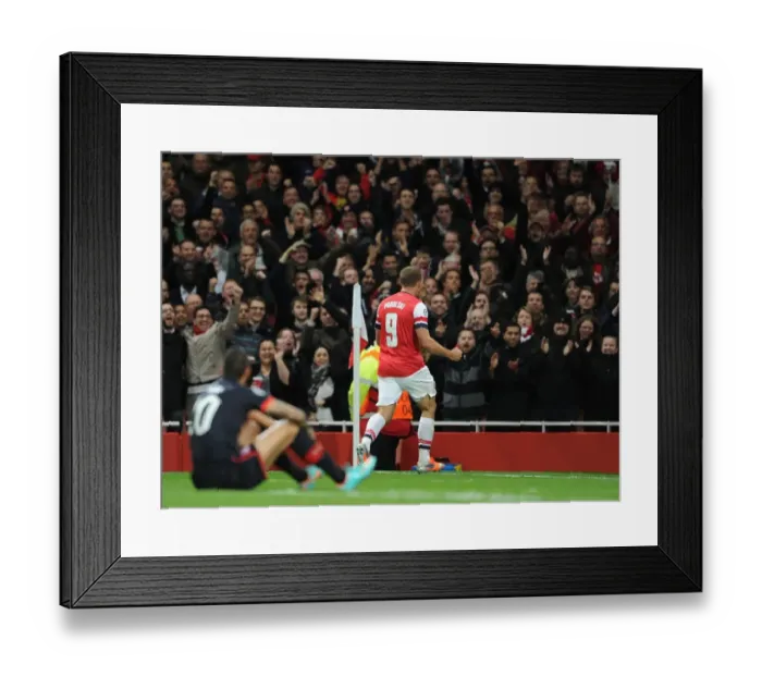 Framed Print : Arsenal's Lukas Podolski Scores Second Goal Against Olympiacos in UEFA Champions League: Arsenal 3-1 Framed Print : Arsenal's Lukas Podolski Scores Second Goal Against Olympiacos in UEFA Champions League: Arsenal 3-1
