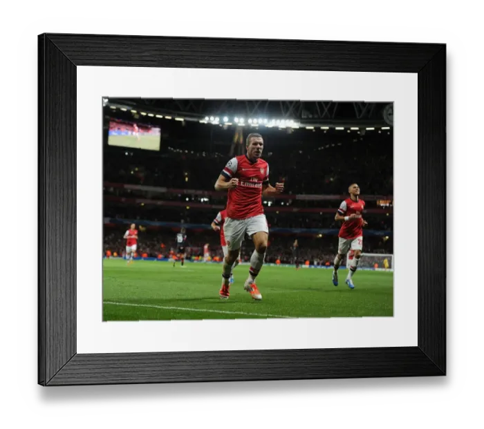 Framed Print : Lukas Podolski Scores the Second Goal: Arsenal FC vs. Olympiacos FC, UEFA Champions League, 2012