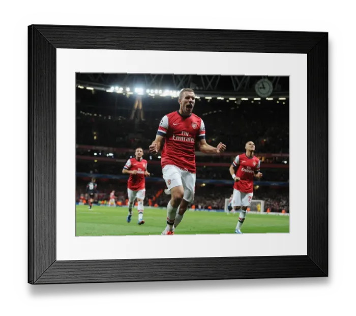 Framed Print : Podolski's Brace: Arsenal Secures Champions League Victory over Olympiacos Framed Print : Podolski's Brace: Arsenal Secures Champions League Victory over Olympiacos