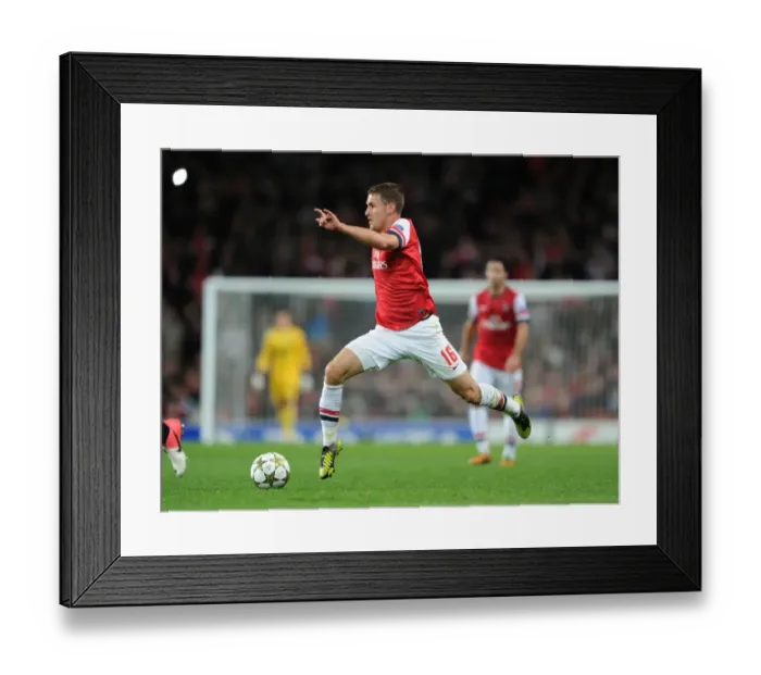 Framed Print : Arsenal's Aaron Ramsey in Action against Olympiacos, UEFA Champions League 2012-13 Framed Print : Arsenal's Aaron Ramsey in Action against Olympiacos, UEFA Champions League 2012-13
