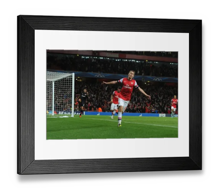 Framed Print : Aaron Ramsey's Hat-Trick: Arsenal's Champions League Triumph Over Olympiacos (October 2012)