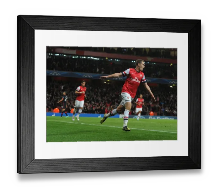 Framed Print : Arsenal's Champions League Victory: Aaron Ramsey's Hat-Trick Against Olympiacos (2012) Framed Print : Arsenal's Champions League Victory: Aaron Ramsey's Hat-Trick Against Olympiacos (2012)