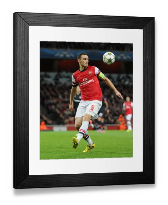 Framed Print : Thomas Vermaelen (Arsenal). Arsenal 3: 1 Olympiacos. UEFA Champions League