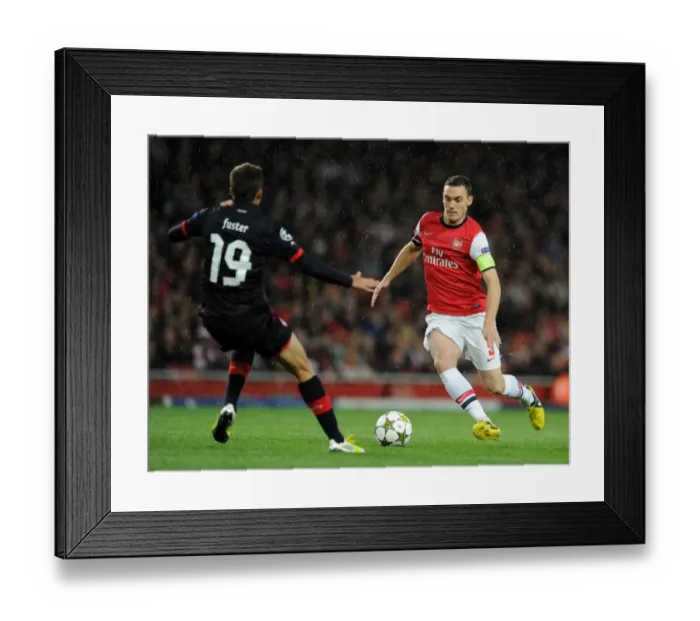 Framed Print : Thomas Vermaelen (Arsenal) David Fuster (Olympiacos). Arsenal 3: 1 Olympiacos
