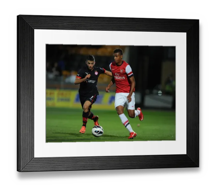 Framed Print : Martin Angha (Arsenal) Dimitrios Siopis (Olympiacos). Arsenal U19 0: 0 Olympiacos U19