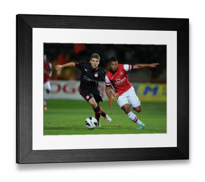 Framed Print : Serge Gnabry Outmaneuvers Dimitrios Voutsiotis: Arsenal U19 vs Olympiacos U19, NextGen Series 2012-13 Framed Print : Serge Gnabry Outmaneuvers Dimitrios Voutsiotis: Arsenal U19 vs Olympiacos U19, NextGen Series 2012-13