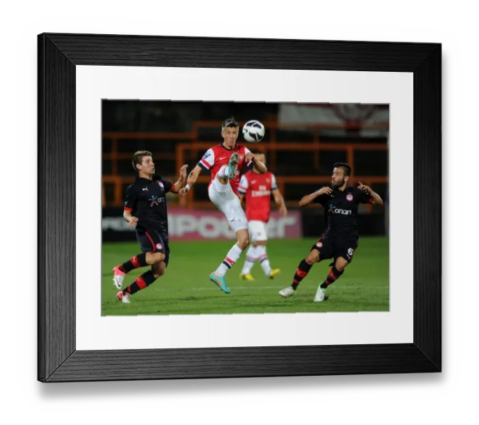 Framed Print : Arsenal U19 vs Olympiacos U19: Tense Battle at Underhill Stadium - Olsson Faces Off Against Voutsiotis and Siopos Framed Print : Arsenal U19 vs Olympiacos U19: Tense Battle at Underhill Stadium - Olsson Faces Off Against Voutsiotis and Siopos