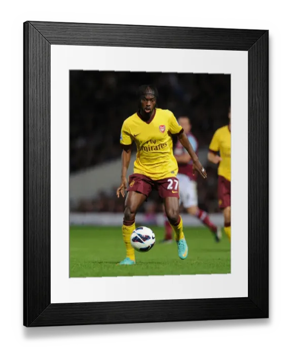 Framed Print : Gervinho in Action: West Ham United vs. Arsenal, Premier League 2012-13
