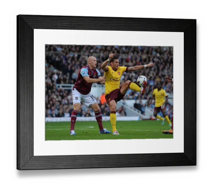 Framed Print : Clash at the Boleyn: Giroud vs. Collins - West Ham United vs. Arsenal (2012-13) Framed Print : Clash at the Boleyn: Giroud vs. Collins - West Ham United vs. Arsenal (2012-13)