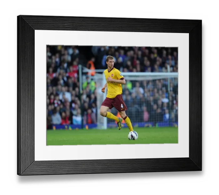 Framed Print : Per Mertesacker (Arsenal). West Ham United 1: 3 Arsenal. Barclays Premier League