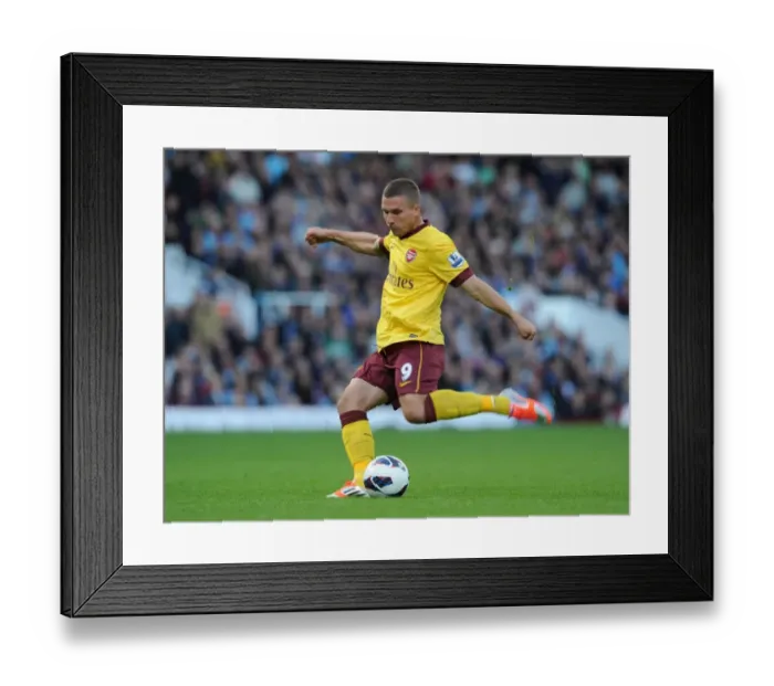Framed Print : Lukas Podolski in Action: West Ham United vs Arsenal, Premier League 2012-13