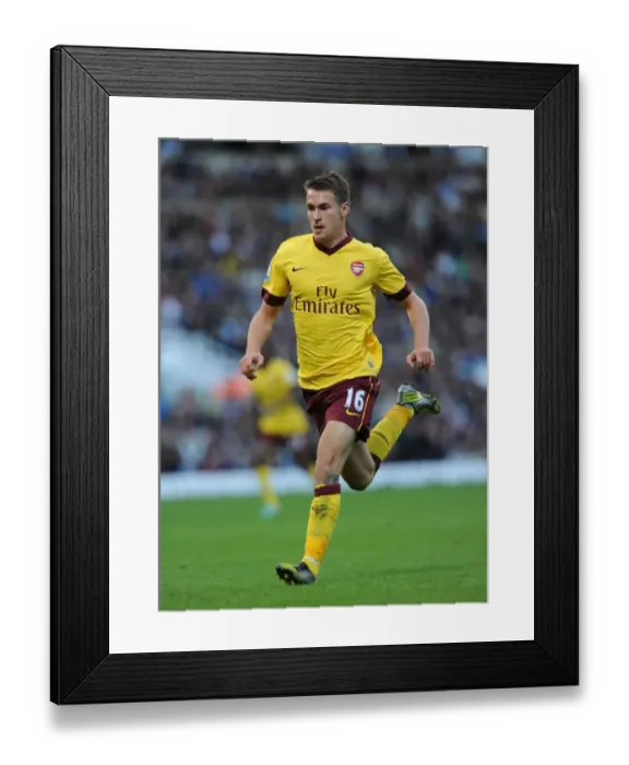 Framed Print : Aaron Ramsey in Action: West Ham United vs Arsenal, Premier League 2012-13 Framed Print : Aaron Ramsey in Action: West Ham United vs Arsenal, Premier League 2012-13
