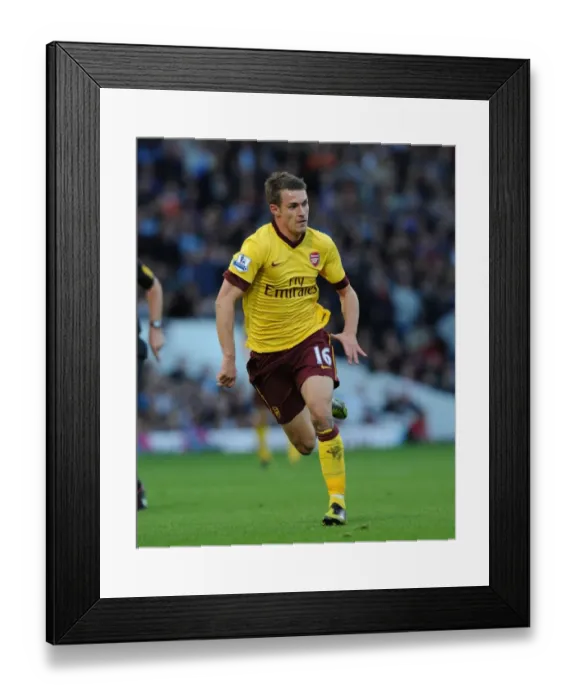 Framed Print : Aaron Ramsey in Action: West Ham United vs. Arsenal, Premier League 2012-13
