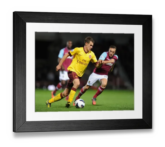 Framed Print : Aaron Ramsey Breaks Past Mark Noble: West Ham United vs. Arsenal, Premier League 2012-13 Framed Print : Aaron Ramsey Breaks Past Mark Noble: West Ham United vs. Arsenal, Premier League 2012-13