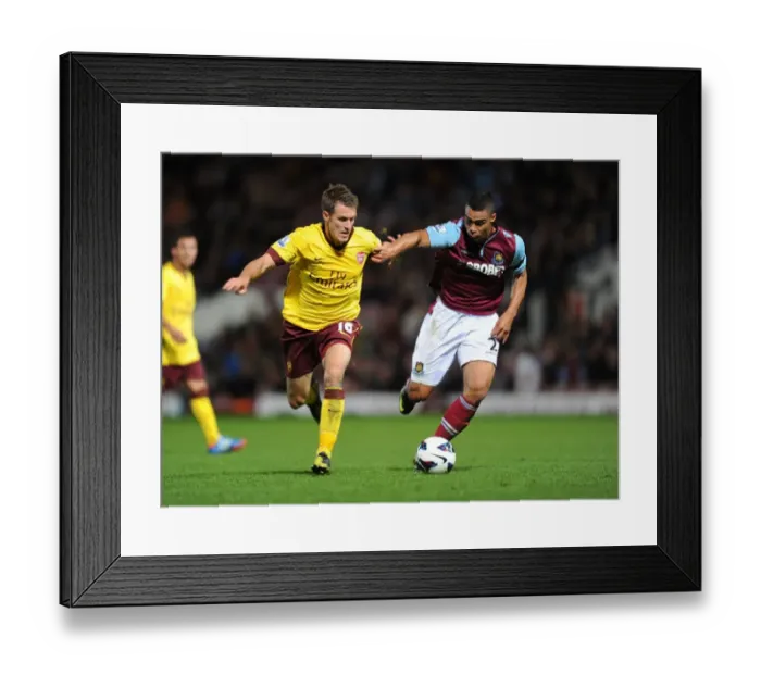 Framed Print : Aaron Ramsey Outmaneuvers Winston Reid: West Ham United vs. Arsenal, Premier League 2012-13 Framed Print : Aaron Ramsey Outmaneuvers Winston Reid: West Ham United vs. Arsenal, Premier League 2012-13