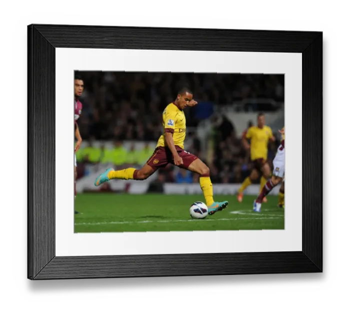 Framed Print : Theo Walcott's Stunner: Arsenal's 3rd Goal vs. West Ham United (2012-13)