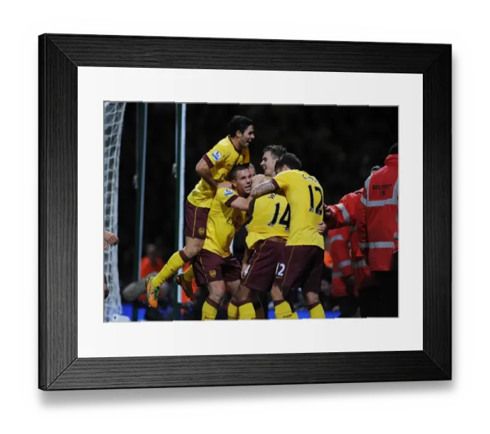 Framed Print : Four Stars: Walcott, Podolski, Ramsey, and Giroud Celebrate Arsenal's Win Against West Ham United (2012-13) Framed Print : Four Stars: Walcott, Podolski, Ramsey, and Giroud Celebrate Arsenal's Win Against West Ham United (2012-13)