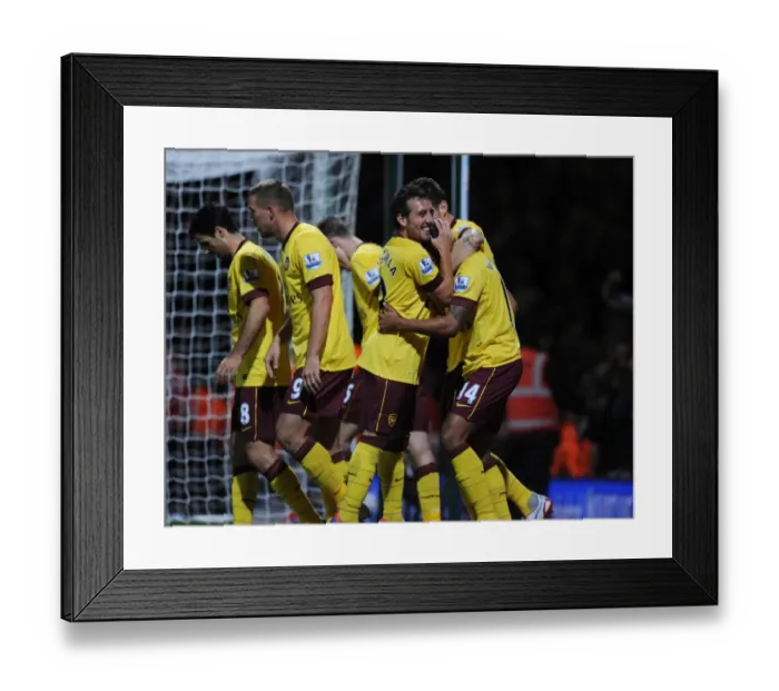 Framed Print : Theo Walcott and Santi Cazorla Celebrate Arsenal's Goals Against West Ham United (2012-13) Framed Print : Theo Walcott and Santi Cazorla Celebrate Arsenal's Goals Against West Ham United (2012-13)