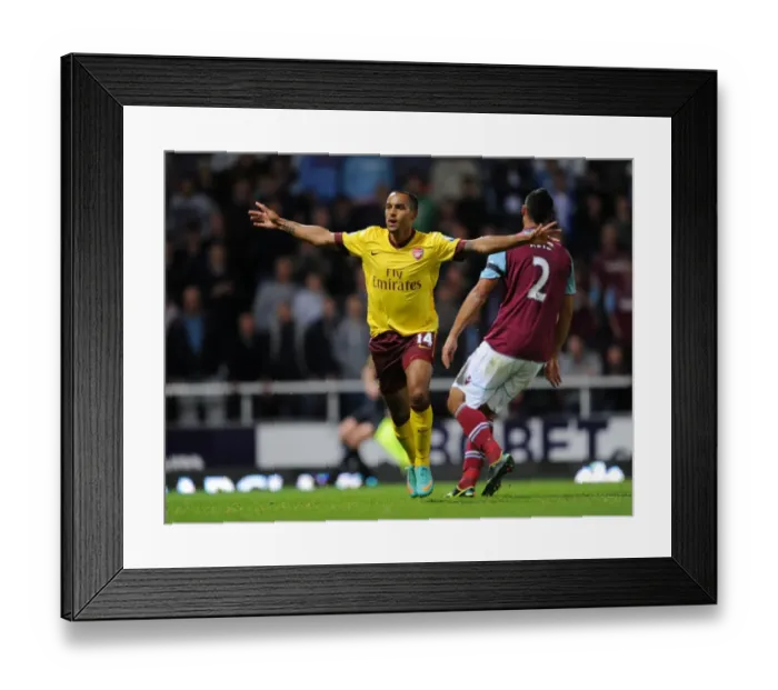 Framed Print : Theo Walcott's Brace: Arsenal's Triumph over West Ham United (2012-13)