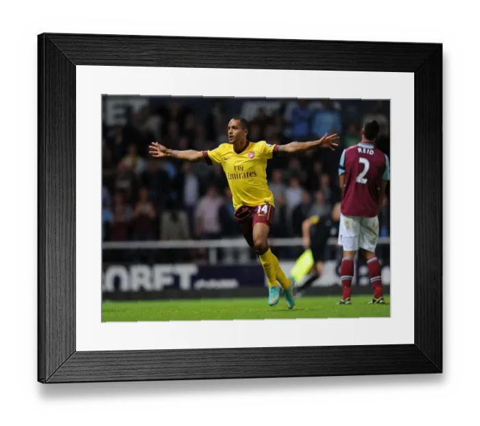 Framed Print : Theo Walcott's Brace: Arsenal's Triumph over West Ham United (2012-13) Framed Print : Theo Walcott's Brace: Arsenal's Triumph over West Ham United (2012-13)