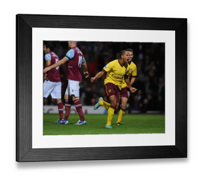 Framed Print : Theo Walcott's Brace: Arsenal's Triumph over West Ham United (2012-13) Framed Print : Theo Walcott's Brace: Arsenal's Triumph over West Ham United (2012-13)