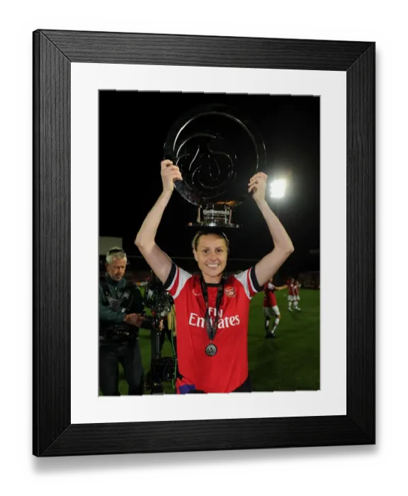 Framed Print : Kelly Smith Lifts the WSL Continental Cup: Arsenal's Historic Victory over Birmingham City