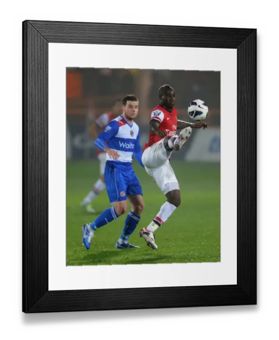 Framed Print : Frimpong vs. Guthrie: Intense Battle in Arsenal U21 vs. Reading U21 (2012-13) Framed Print : Frimpong vs. Guthrie: Intense Battle in Arsenal U21 vs. Reading U21 (2012-13)