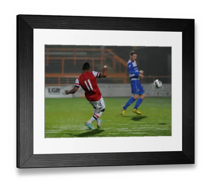 Framed Print : Serge Gnabry scores Arsenals 1st goal. Arsenal U21 2: 0 Reading U21. Barclays Premier U21 League