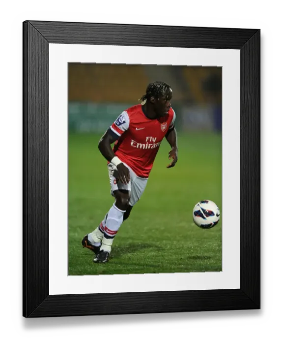 Framed Print : Bacary Sagna in Action: Arsenal U21 vs Reading U21, 2012-13 Framed Print : Bacary Sagna in Action: Arsenal U21 vs Reading U21, 2012-13