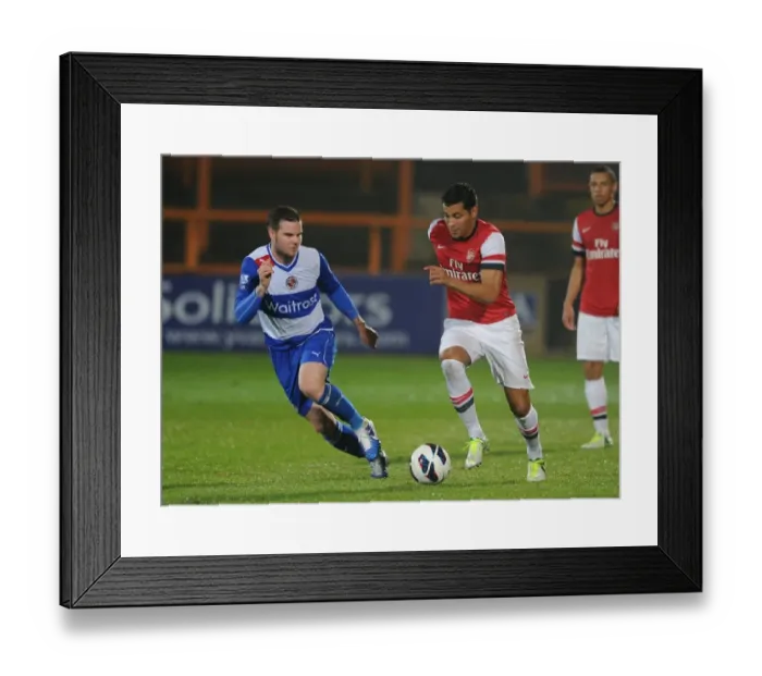 Framed Print : Andre Santos (Arsenal) Danny Guthrie (Reading). Arsenal U21 2: 0 Reading U21