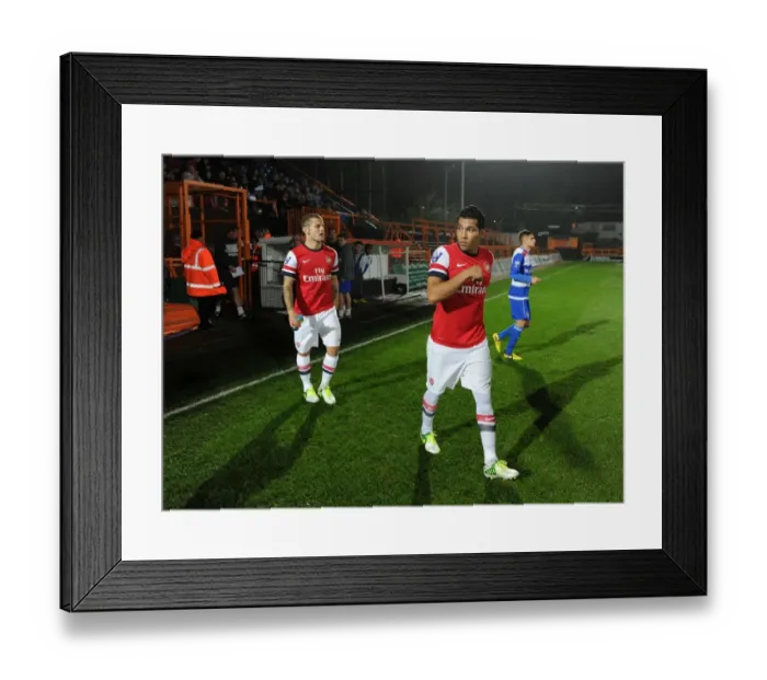 Framed Print : Arsenal U21: Santos and Wilshere Prepare for Reading Clash (2012-13)