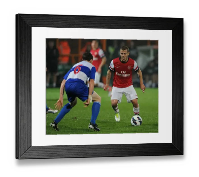 Framed Print : Jack Wilshere vs. Niall Keown: Clash of Young Talents in Arsenal U21 vs. Reading U21 (2012-13)