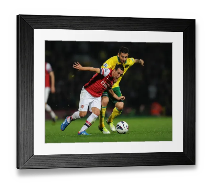Framed Print : Santi Cazorla Dashes Past Bradley Johnson: Norwich City vs Arsenal, Premier League 2012-13