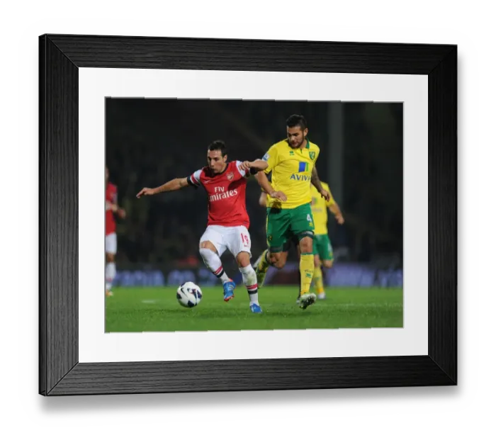 Framed Print : Clash of Midfielders: Santi Cazorla vs. Bradley Johnson (Norwich City vs. Arsenal, 2012-13)