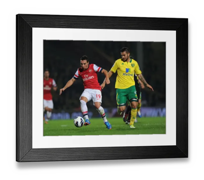 Framed Print : Clash of Midfield Maestros: Santi Cazorla vs. Bradley Johnson (Norwich City vs. Arsenal, 2012-13)