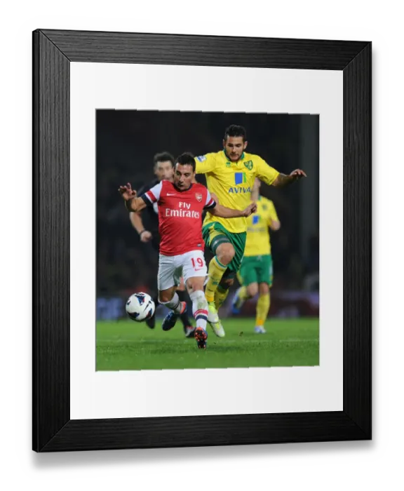 Framed Print : Clash of Midfield Talents: Santi Cazorla vs. Bradley Johnson (Norwich City vs. Arsenal, 2012-13)