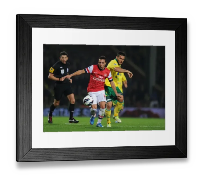 Framed Print : Clash of Midfield Titans: Santi Cazorla vs. Bradley Johnson (Norwich City vs. Arsenal, 2012-13)