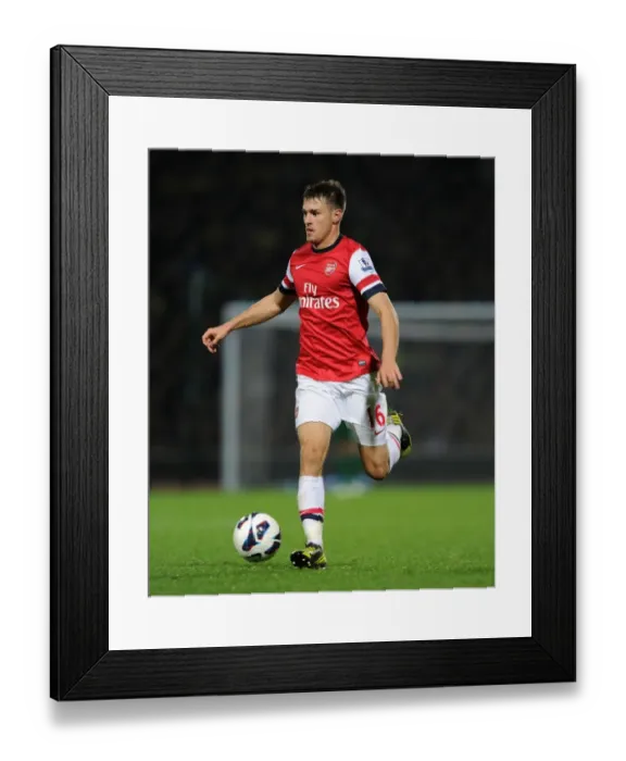 Framed Print : Aaron Ramsey in Action: Norwich City vs Arsenal, Premier League 2012-13